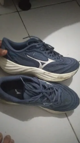 Tenis de corrida