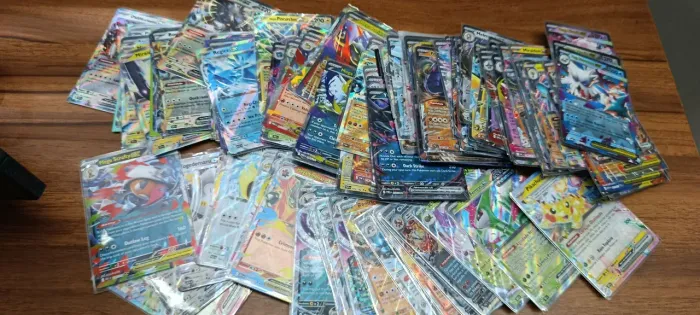 LOTE DE 150 EXS REGULARES POKÉMON TCG