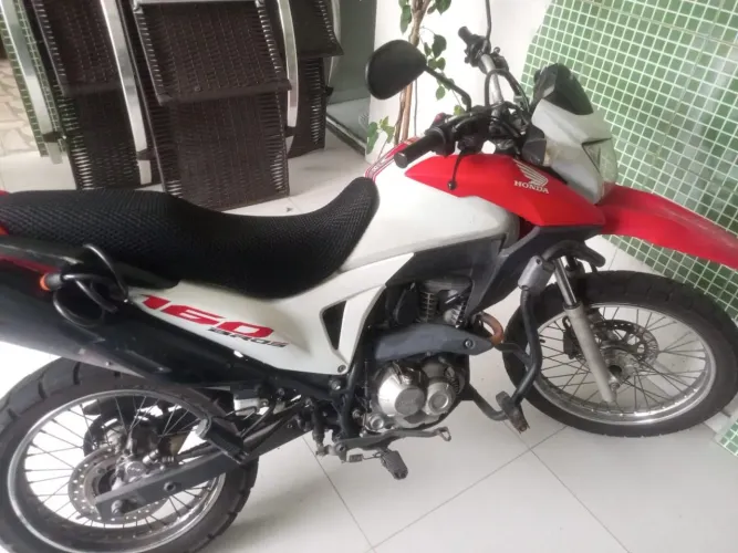 Vendo moto revisada,top de linha
