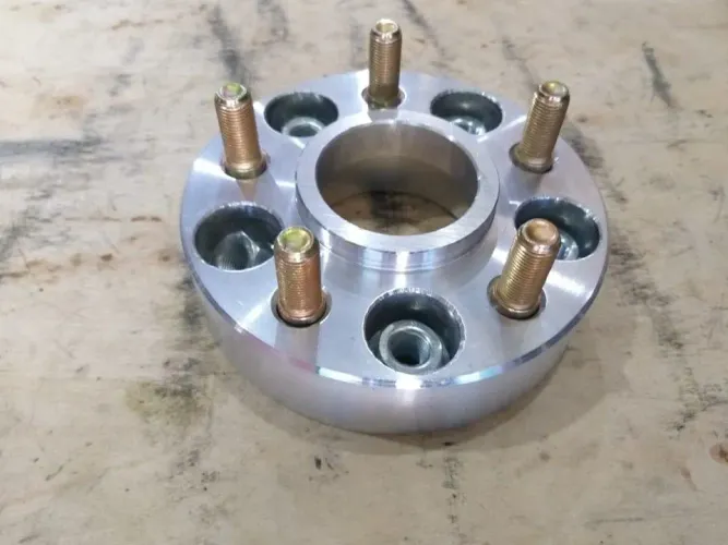 Adaptador e espaçador para rodas 