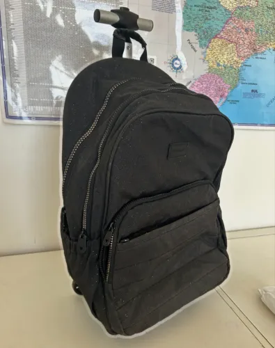 Mochila bagaggio com gliter excelente 