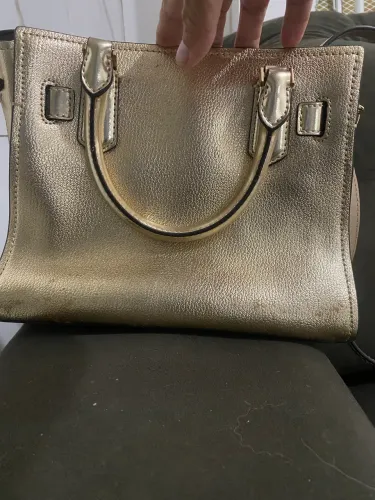 Bolsa dourada Michael Kors