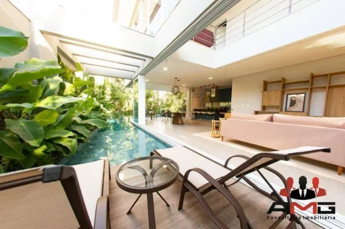 Casa com 5 dormitórios à venda, 583 m² por R$ 6.300.000,00 - Riviera Módulo 28 - Bertioga/