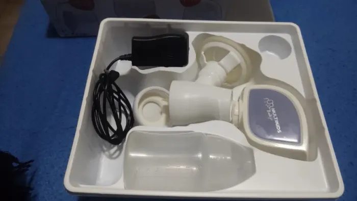 Bomba elétrica de tirar leite marca Multikids 