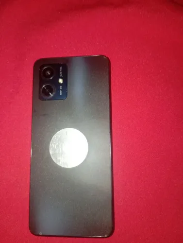 Celular moto g54  apenas com um trinco no canto de baixo do aparelho