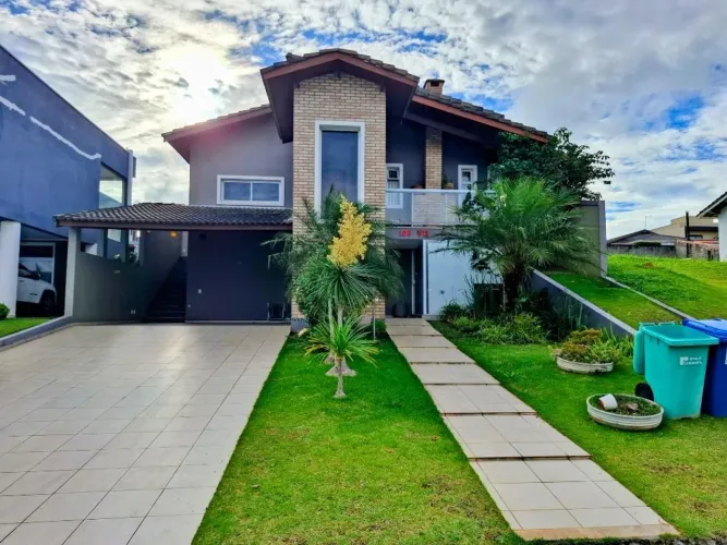 Casa com 3 dormitórios para alugar, 250 m² por R$ 8.200,00/mês - Santa Adélia - Vargem Gra