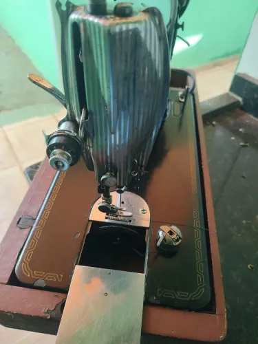 Máquina de costura singer