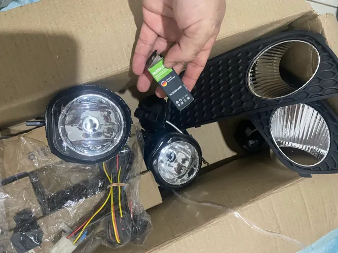 Farol de milha palio novo na caixa