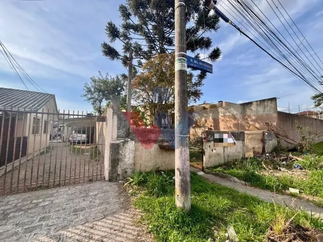 Terreno com 346 m e 4 casas locadas Investimento seguro e alta valorização