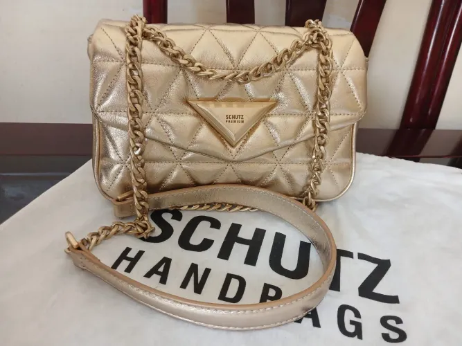 Bolsa dourada 944 schutz