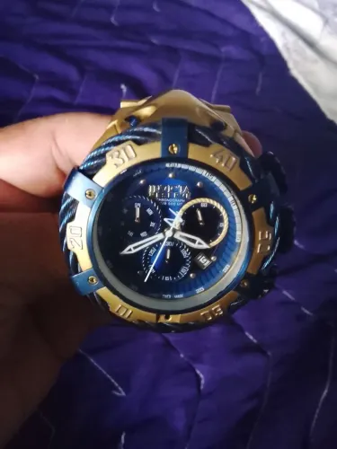 Vendo ou troco relógio invicta original por bicicleta motorizada.