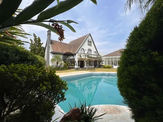 Sobrado com 5 dormitórios à venda, 650 m² por R$ 4.500.000,00 - Lago Azul Golfe Clube - Ar