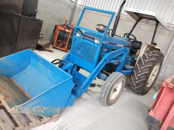 ford 6610 com lamina e concha