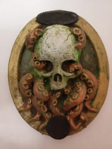 escultura cranio polvo 