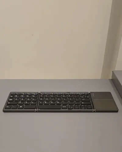 Teclado portátil dobrável sem fio Bluetooth com touchpad Windows, Android e IOS