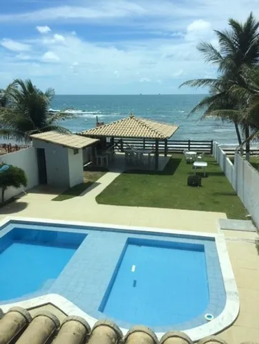 Aluguel por temporada de casa com 08 suítes à beira mar de Enseada dos Corais
