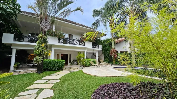 Casa em condomínio com 5 quartos e 4 suítes à venda, 604 m² por R$ 4.950.000,00 - Barra da