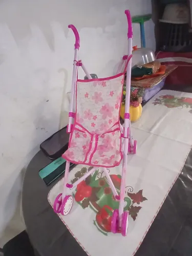 Carinho pra boneca super conservado 