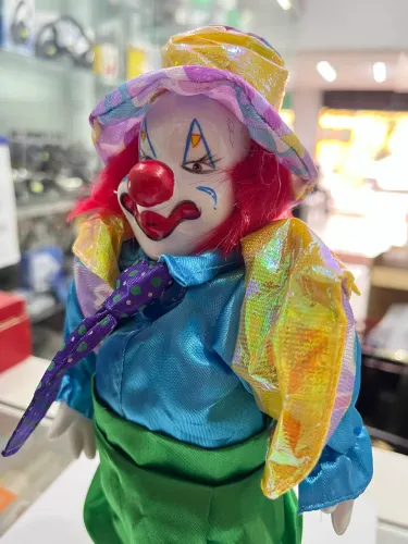 Palhaço musical a corda porcelana