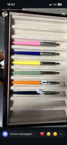 Caneta parker jotter verde (centro da foto)