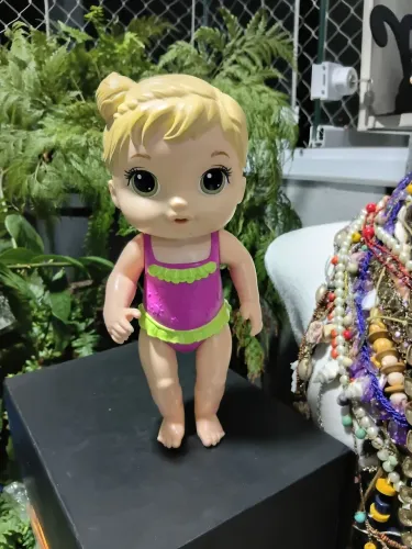 Boneca Baby Alive articulada dia de sol.