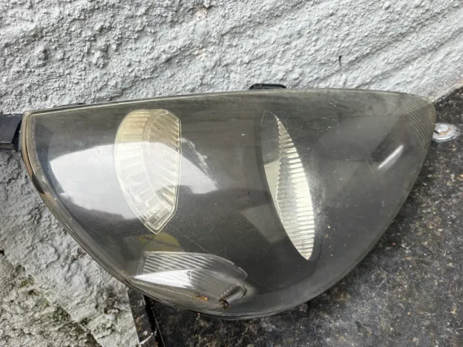 Farol Honda fit 2004 a 2008 lado passageiro 