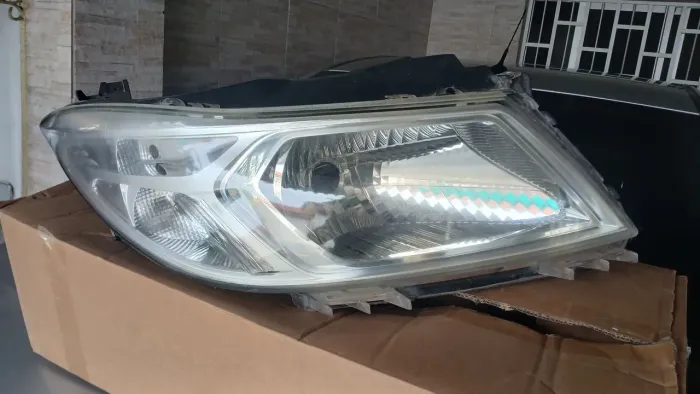 Farol original onix 2013