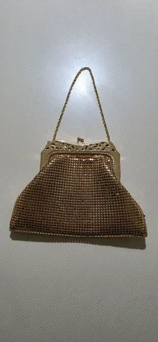 Bolsa de festa dourada