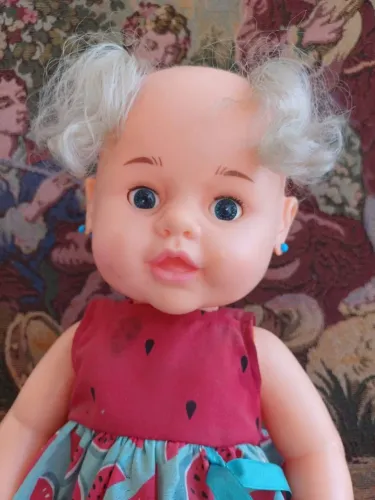 boneca é a clássica Boneca Papa Papinha da Estrela