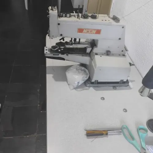 Máquina de pregar botões