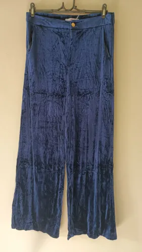 Calça de veludo molhado
