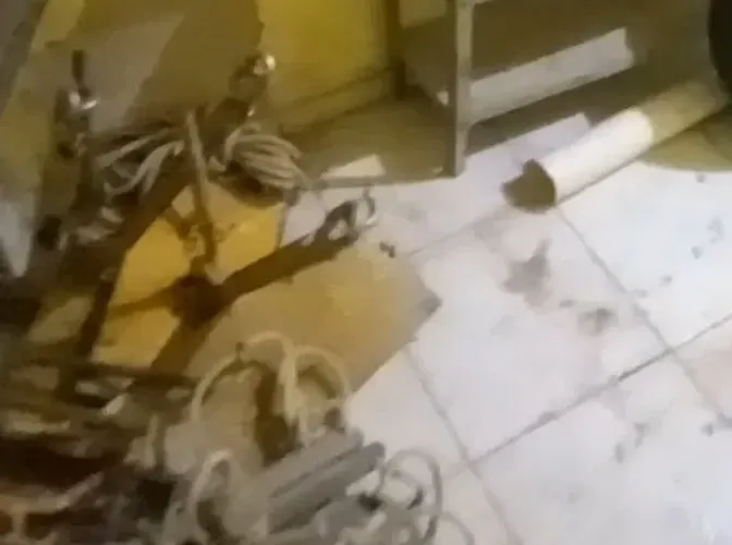 Cadeira suspensa de rapel para pinturas de fachada.