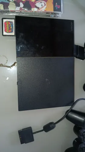 Vendo esse PlayStation 2 em bom estado