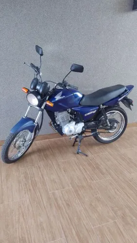 Moto pouca usada com peças original 