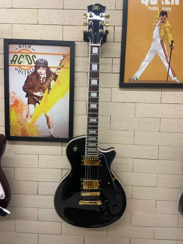 Guitarra SX Les Paul preta com dourado Vintage