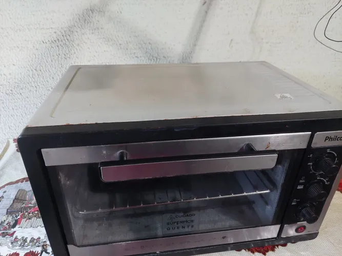 Vendo forno elétrico philco 42 litros usado com marcas de uso