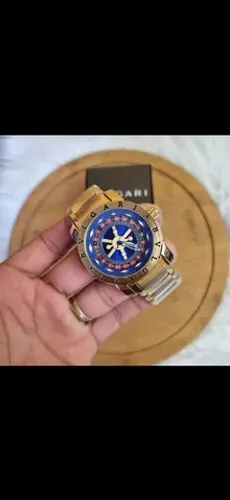 Relógio bvgari Cassiano fundo azul