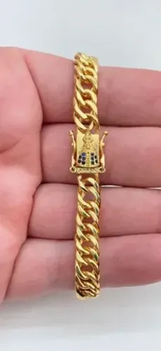 VENDO UMA LINDA PULSEIRA GROSSA BANHADA A OURO 18K(10 CAMADAS EM OURO).