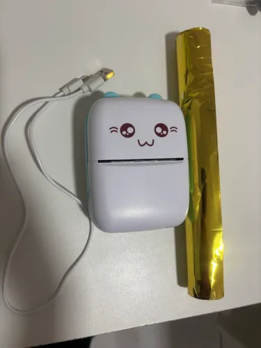Mini impressora + papéis dela