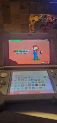 New 3ds com carregador carregado de jogos.