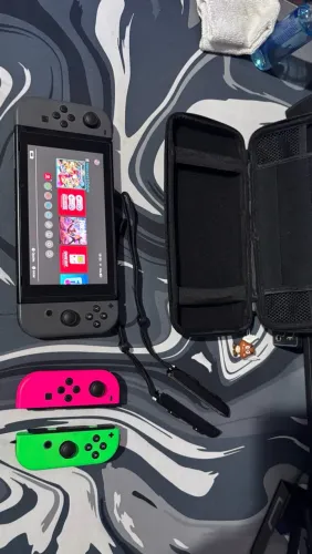 Nintendo switch + super Mario kart + cases de transporte