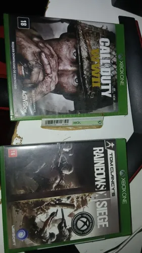 Vendo esses 2 jogos. Call of Duty World War 2 e Rainbow Six Siege.