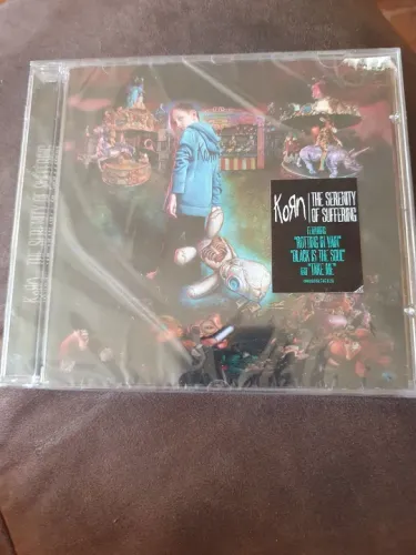 CD Korn - The Serenity of Suffering Grátis um pôster em tecido.