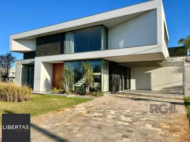 Casa de Condomínio em Atlântida Sul