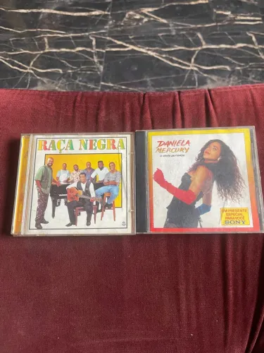 CDs raça negra é Daniela mercury 