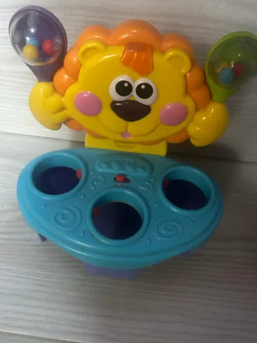 Leão brinquedo de luz e som pedagógico