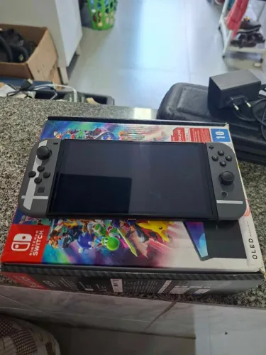 Nintendo Switch Oled ac trocas 