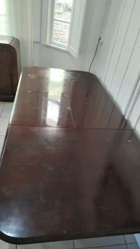 Mesa antiga de imbuía pé palito. 