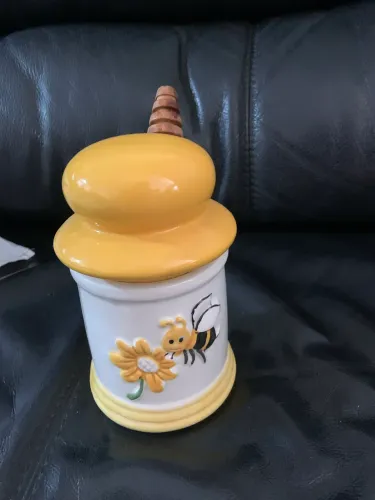 Pote de mel com espátula de abelha 
