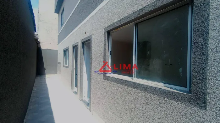 Casa com 2 dormitórios à venda por R$ 330.000 - tude basto - Praia Grande/SP